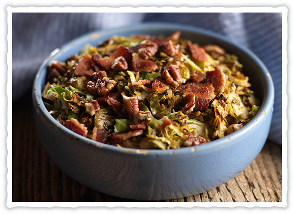 Warm Shaved Brussels Sprouts Salad with Bacon and Maple-Balsamic Dressing